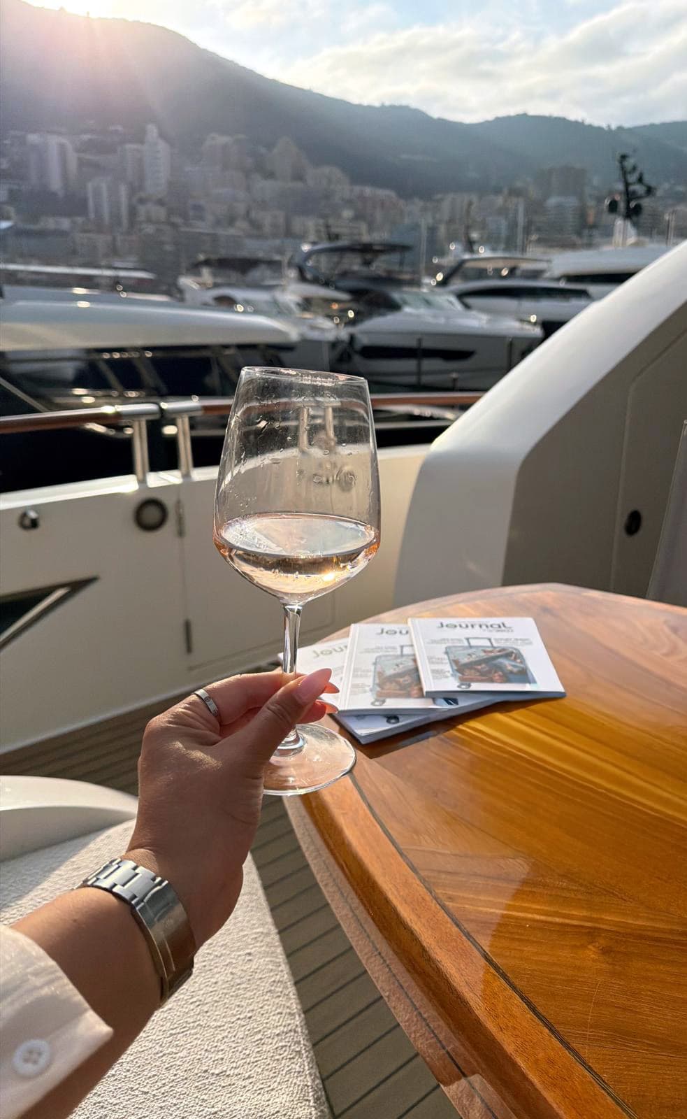 A glass of rosé on the aft deck overlooking Monaco